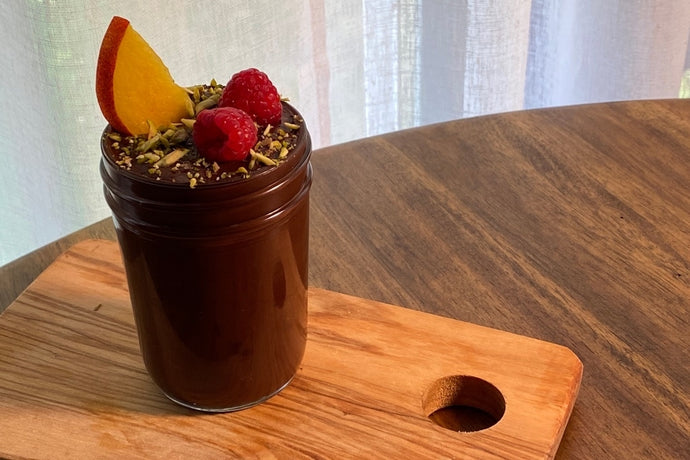 Oat Milk Chocolate Pudding with Berries and Pistachios